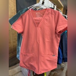 XS coral colored figs scrubs